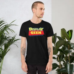 2021 Doll Tale Display Geek - Short-Sleeve Unisex T-Shirt -Displaygeek Shop unisex staple t shirt black front 6187414e76cb1